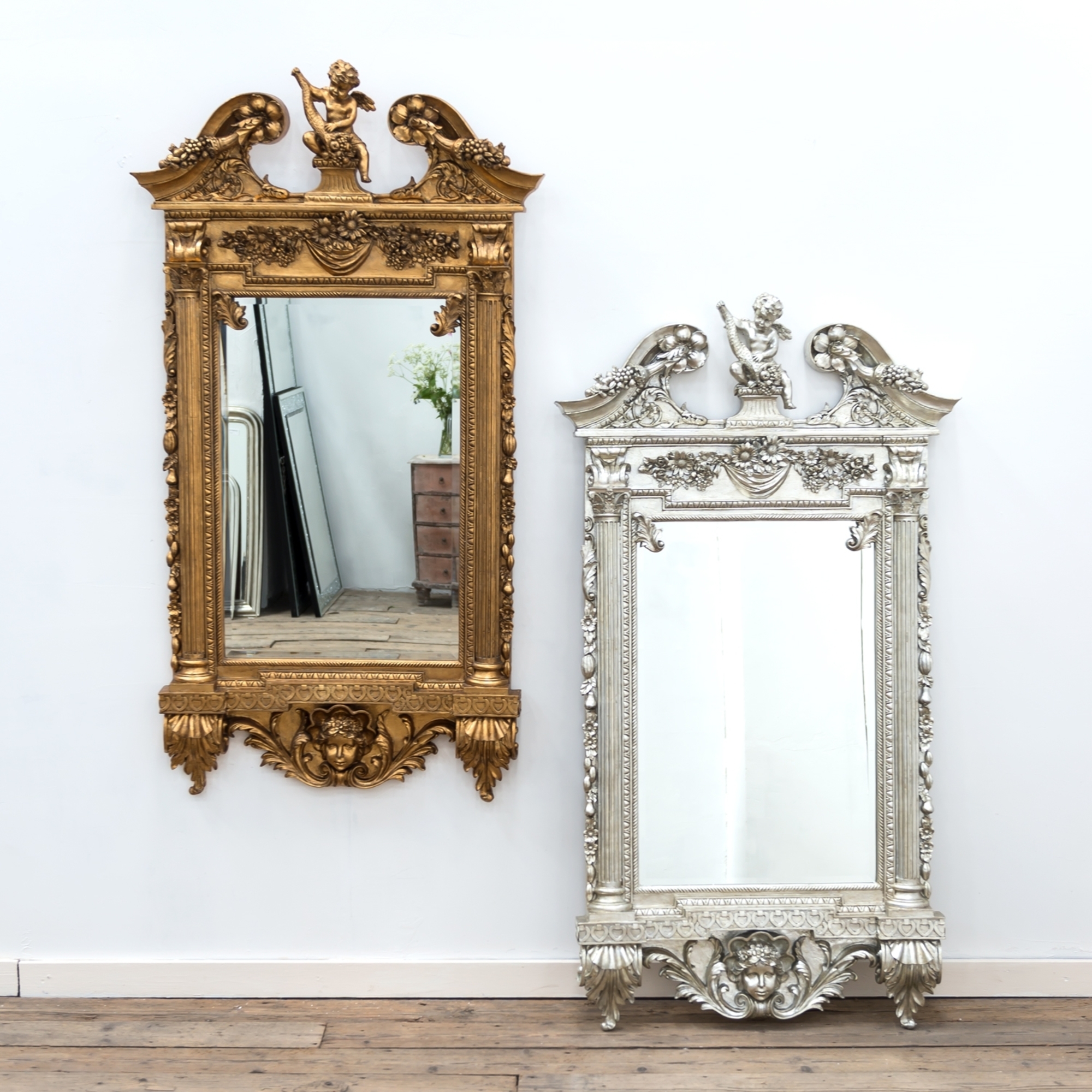 Champagne Silver Gilt Leaf Cherub Frame Mirror