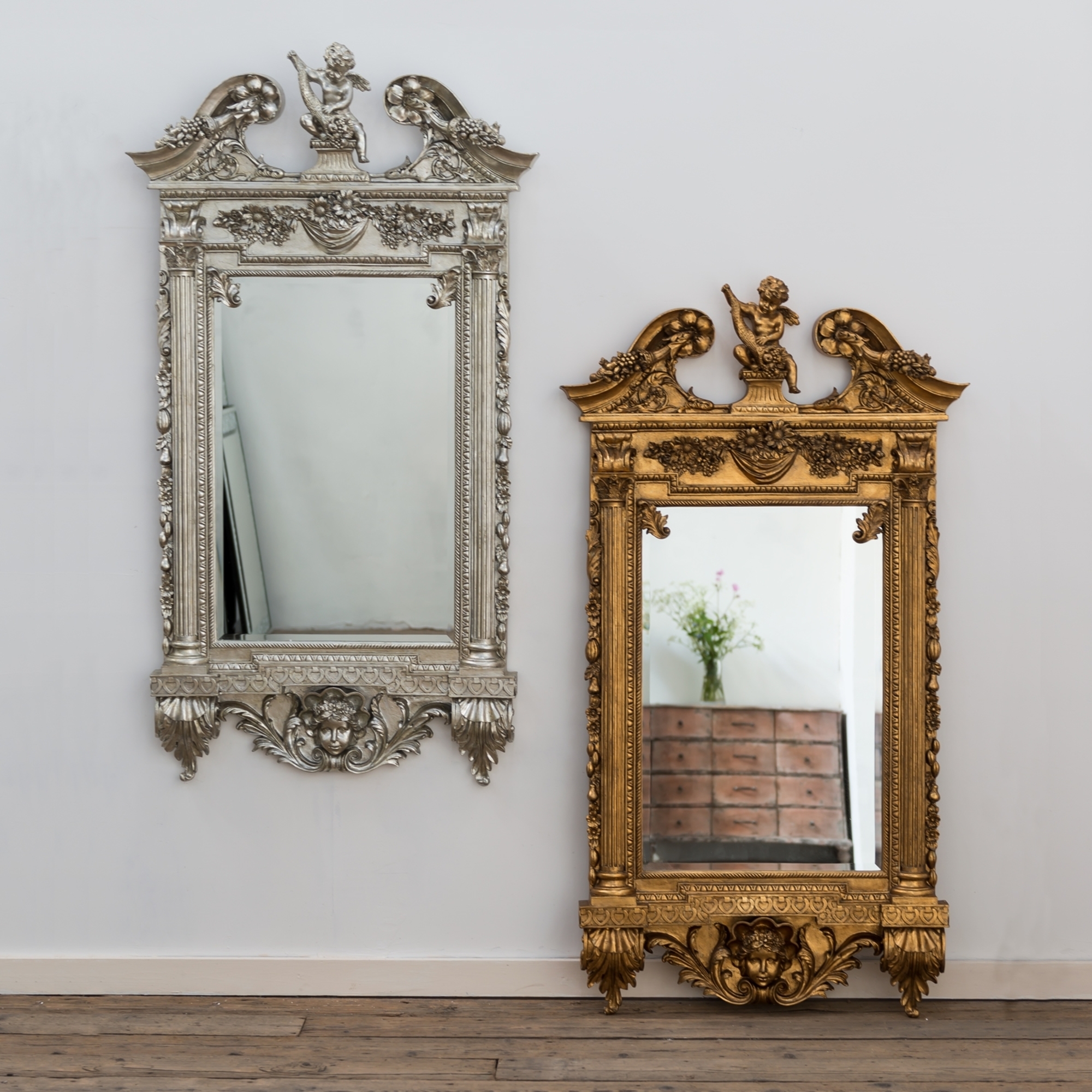 Champagne Silver Gilt Leaf Cherub Frame Mirror
