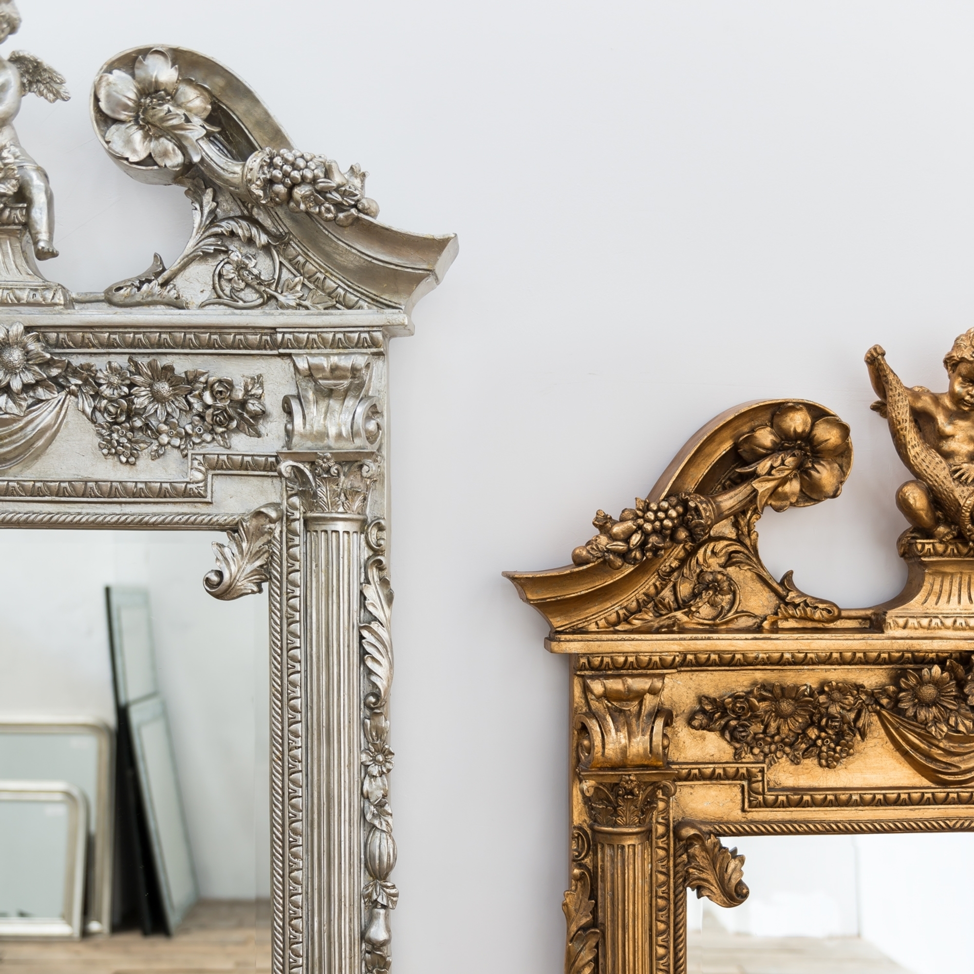 Champagne Silver Gilt Leaf Cherub Frame Mirror